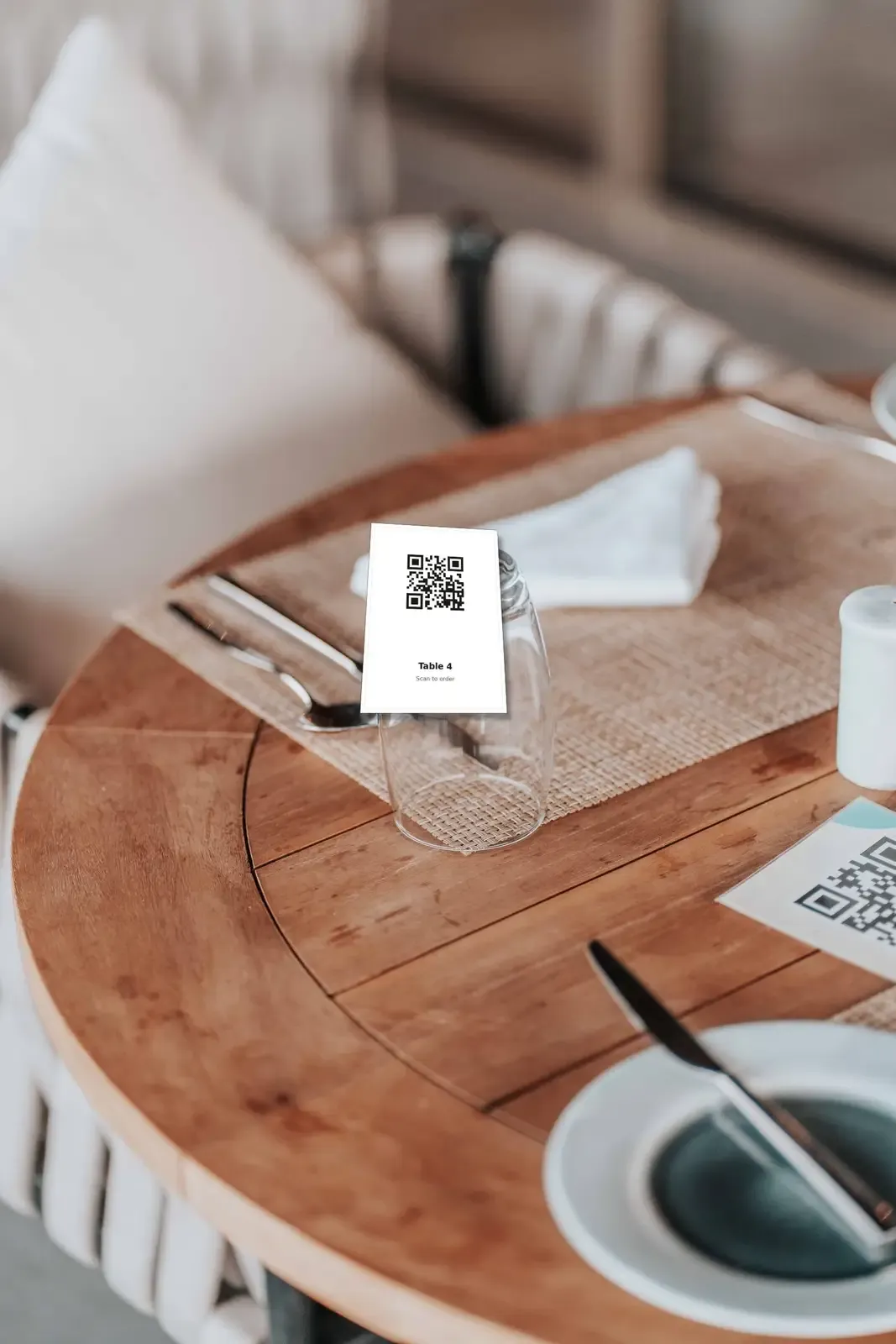 A QR code tent on a restaurant table